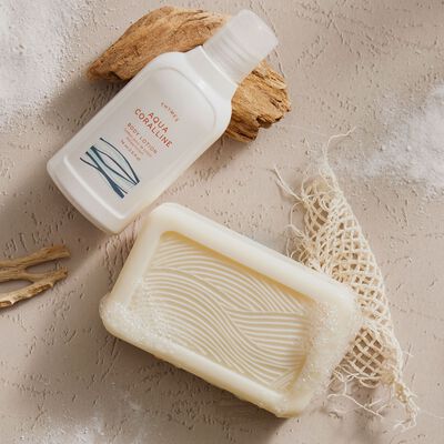 Thymes Aqua Coralline Bar Soap with Moisturizing Bar Soap Formula next to Thymes Aqua Coralline Petite Body Lotion